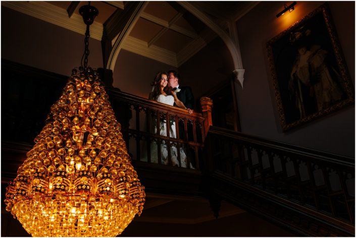 lancashire-wedding-photographer-10001 bride and groom on stairs having a cuddle