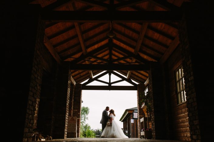 Charnock Farm wedding lancashire photography bride and groom kissing in charnock farm lancashire photography venue